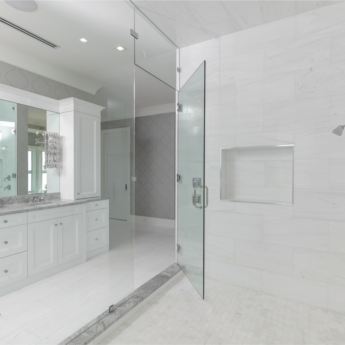 Super White Quartzite Calcatta Quartzite Marble Countertops Bathroom Countertops Bathtub Surround Countertop International Granite and Stone Trinity Construction and Design Ryan Gamma Photographer Double Bathroom Vanity White Cabinets White Tile Gray Tile White and Gray Bathroom Walk In Shower