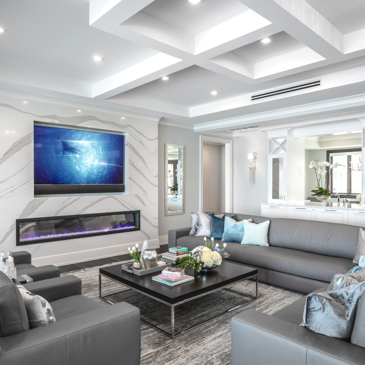 Cambria Brittanica Kitchen Countertops Bathroom Countertops White and Gray Quartz Countertops White Cabinets Kitchen Island marble looking quartz International Granite and Stone Trinity Construction and Design Collaboration gray furniture gray flooring white tile white backsplash