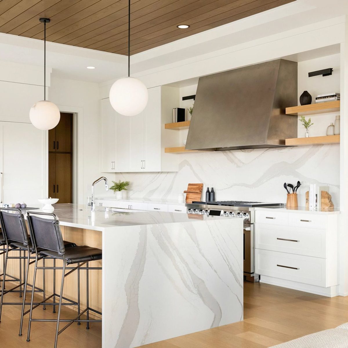 Brittanicca Warm Cambria Quartz Kitchen Countertops with Waterfall Panels and Matching Quartz Full Height Backsplash