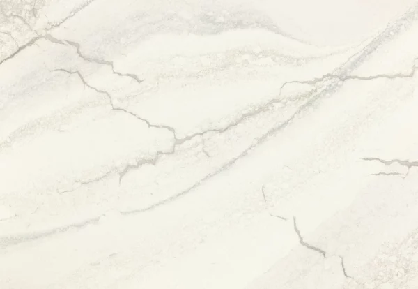 Close-up view of Cambria Inverness Everleigh Quartz surface, showcasing its intricate blend of cool gray and warm, sand-honey tones with debossed Inverness veins.