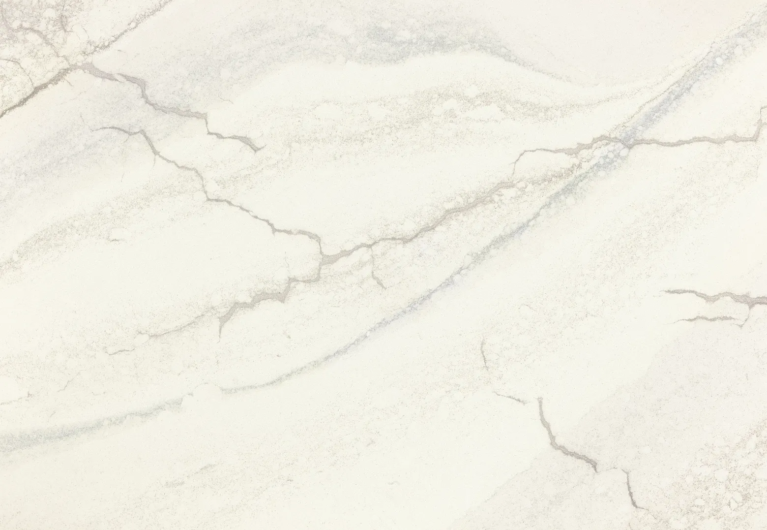 Close-up view of Cambria Inverness Everleigh Quartz surface, showcasing its intricate blend of cool gray and warm, sand-honey tones with debossed Inverness veins.