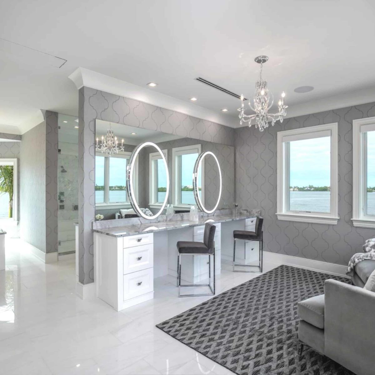 Super White Quartzite Calcatta Quartzite Marble Countertops Bathroom Countertops Bathtub Surround Countertop International Granite and Stone Trinity Construction and Design Ryan Gamma Photographer Double Bathroom Vanity White Cabinets White Tile Gray Tile White and Gray Bathroom Make Up Table Make-Up Vanity Tub Surround